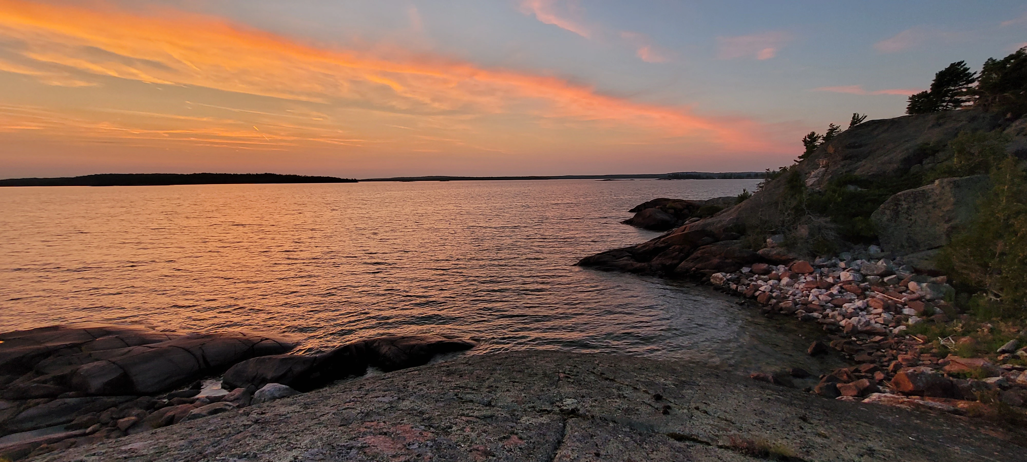 A view of the North Channel from coarse red boulders on the Benjamin Islands in Northern Ontrario, Canada
