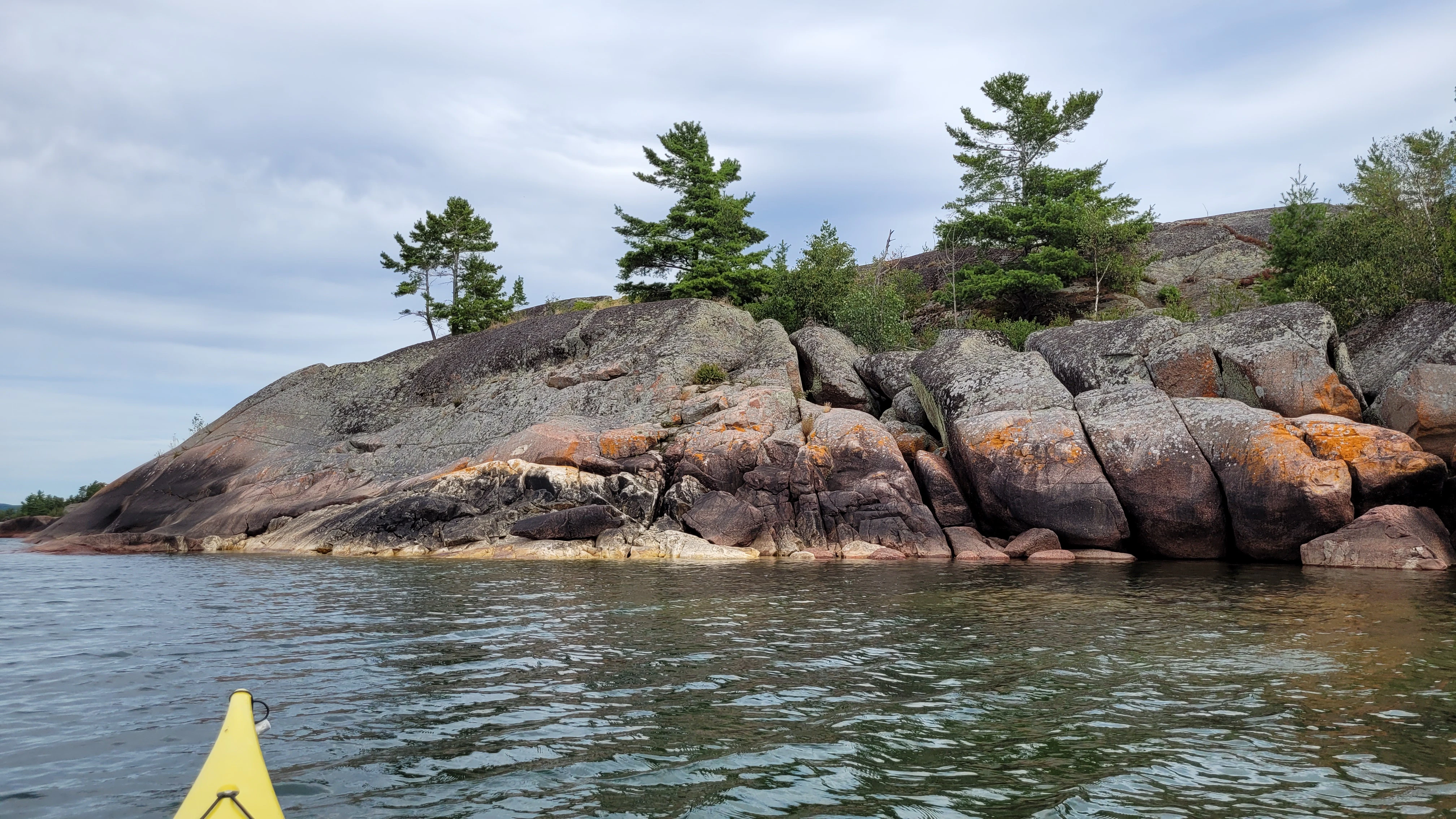 Multi-colored rock formations on North Benjamin Island in Northern Ontrario, Canada