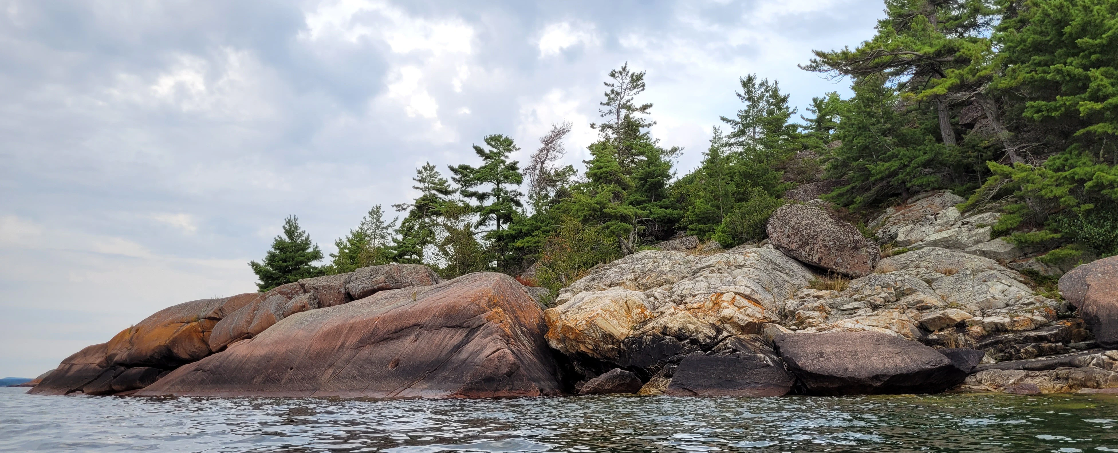 Red Granite meets white Quartzite on the Benjamin Islands in Northern Ontrario, Canada