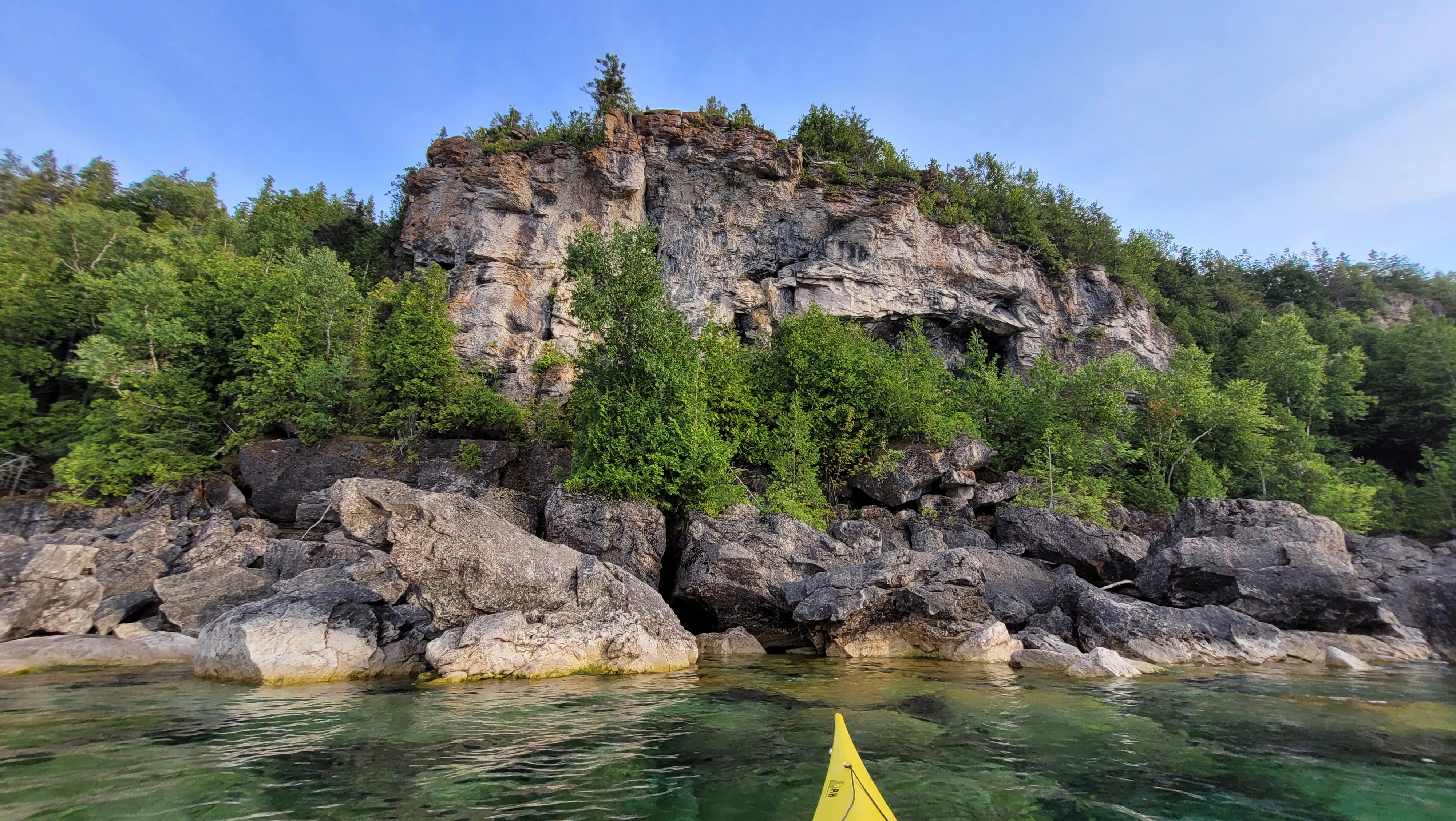Dramatic limestone cliff rising above the waters of Georgian Bay