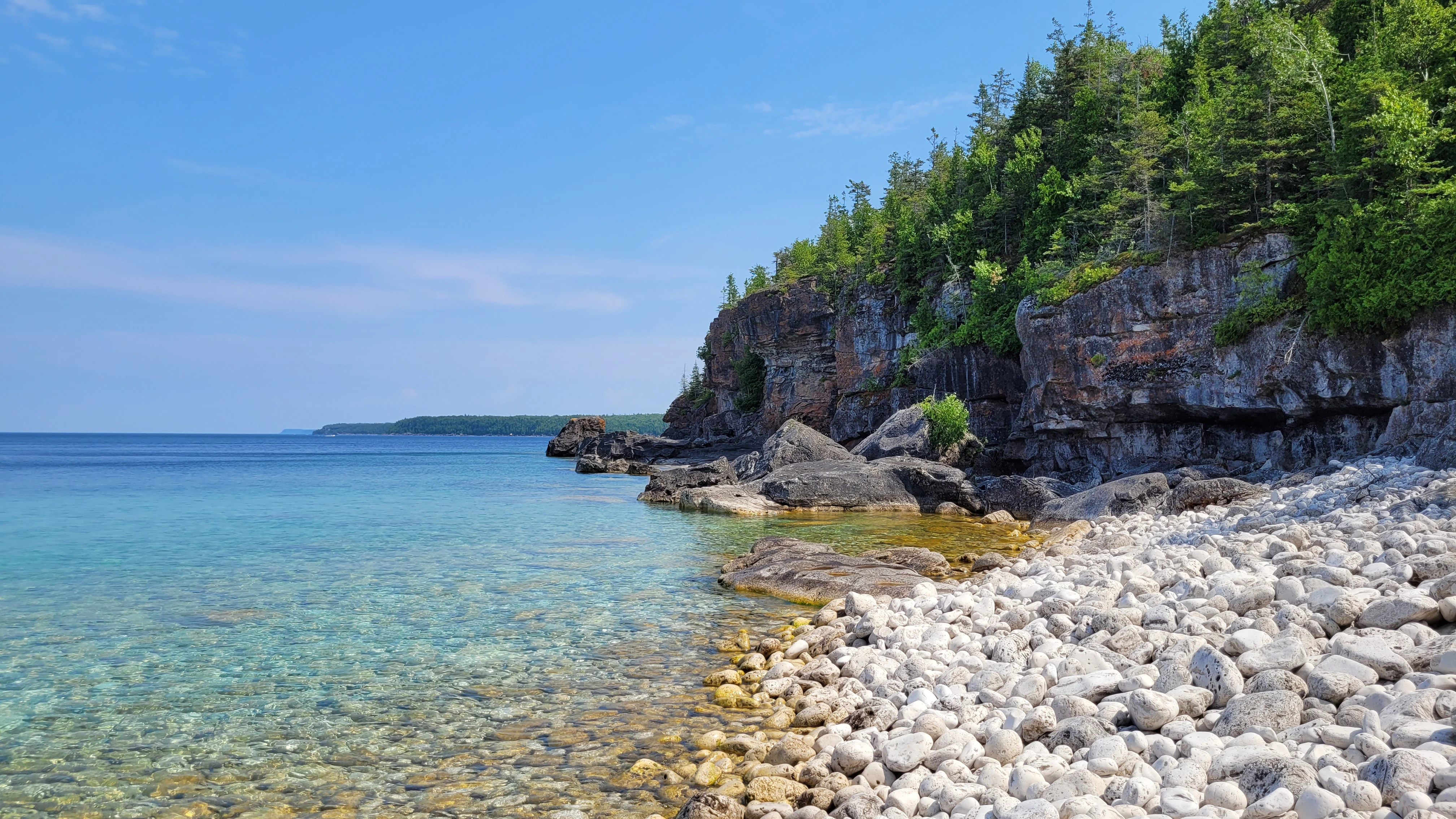 Another view of a kayak resting on a remote Bruce Peninsula beach