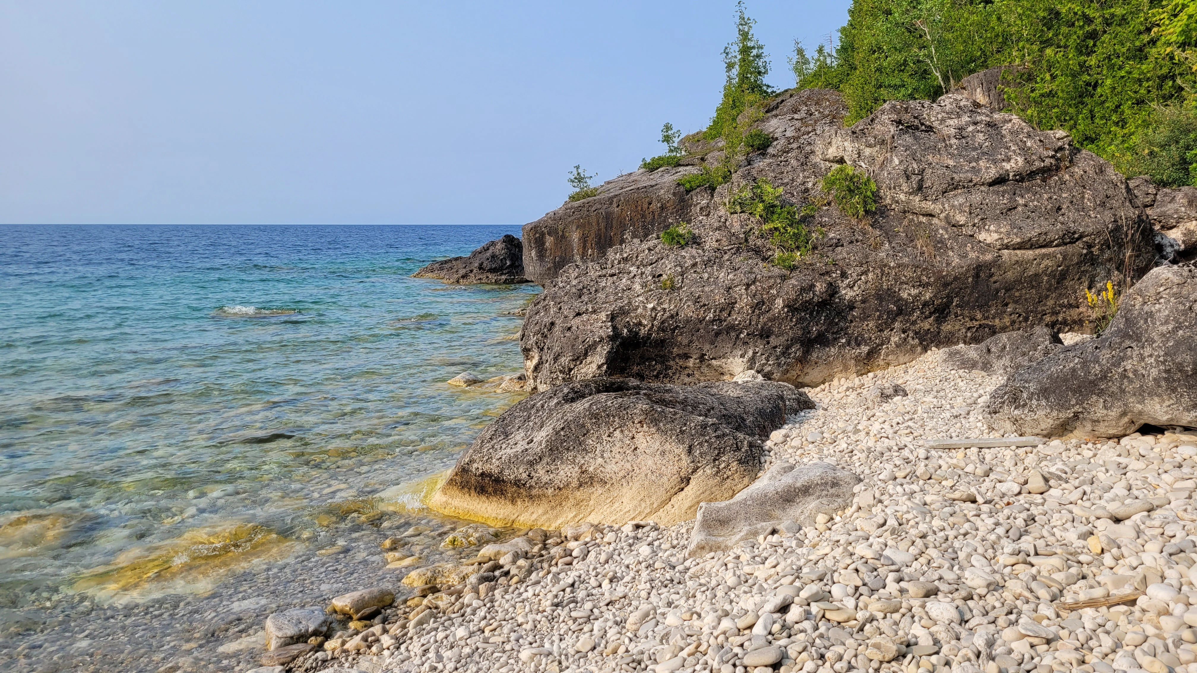 Limestone cliffs reflected in the waters of Georgian Bay near Lions Head