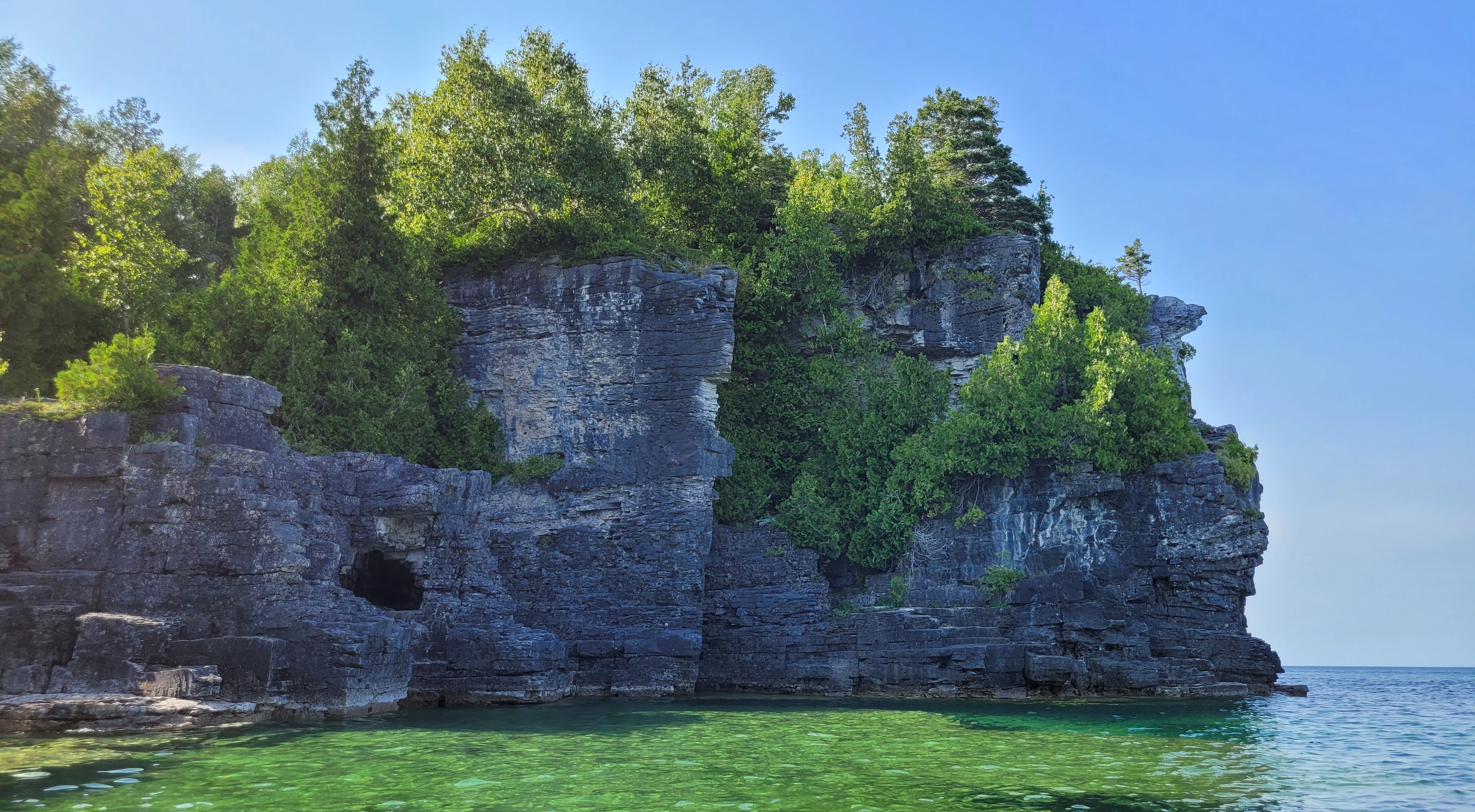 Kayaking beyond the Grotto along the Bruce Peninsula coastline