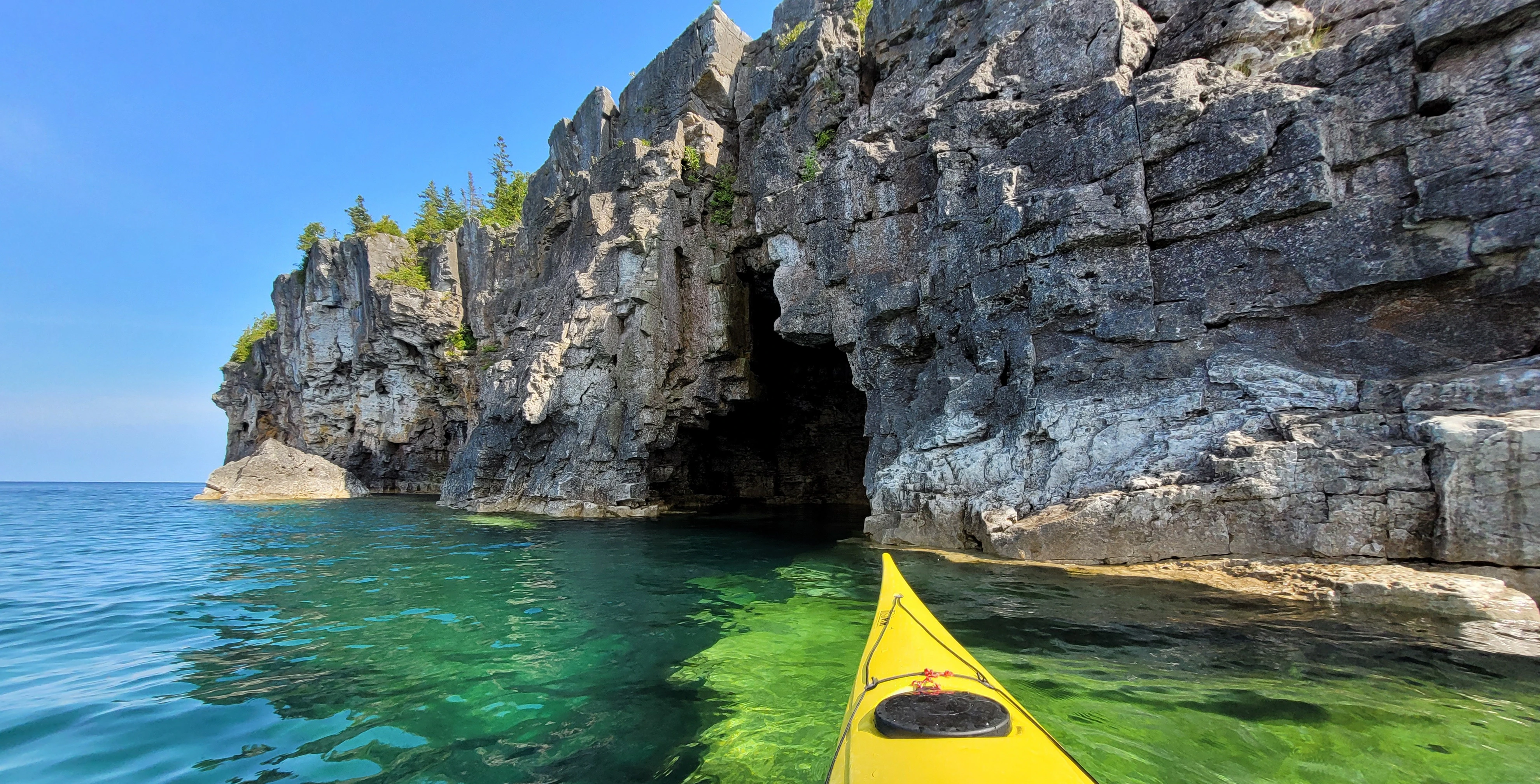 Sea cave carved into the limestone cliffs of the Bruce Peninsula