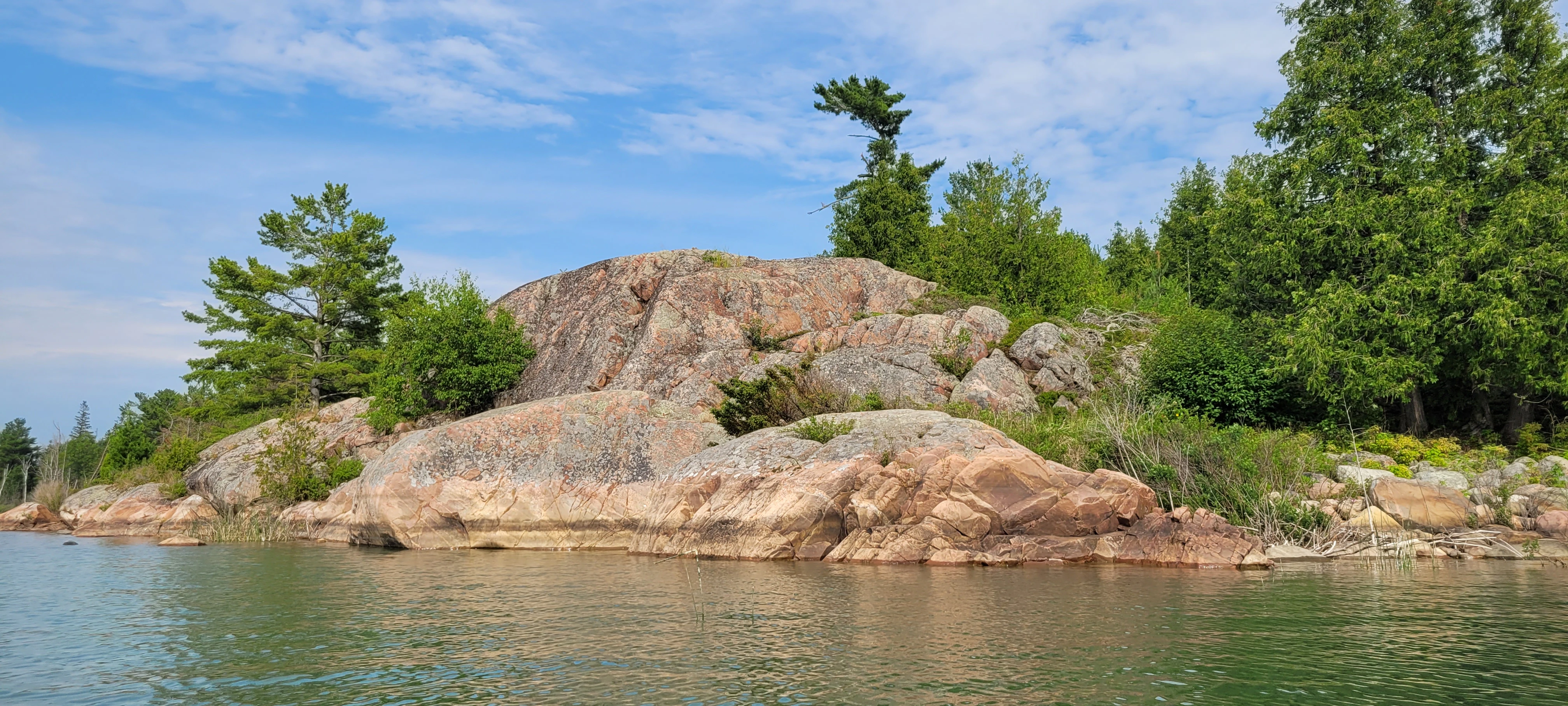 Granite rocks along the coast of Phillip Edward Island