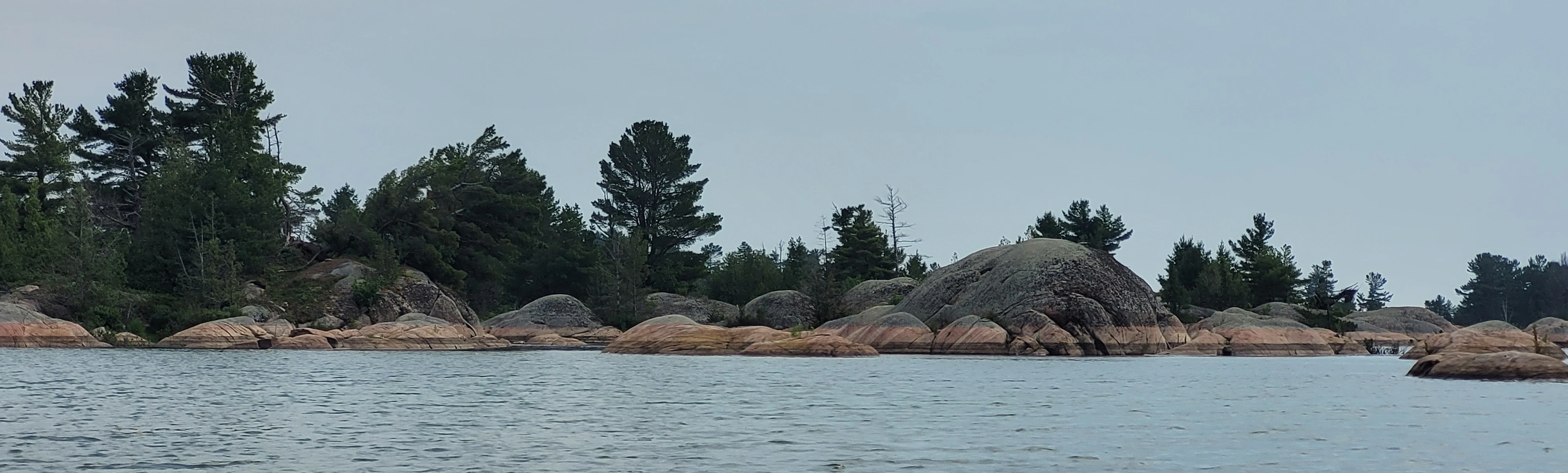 Precambrian granite shoreline of Phillip Edward Island