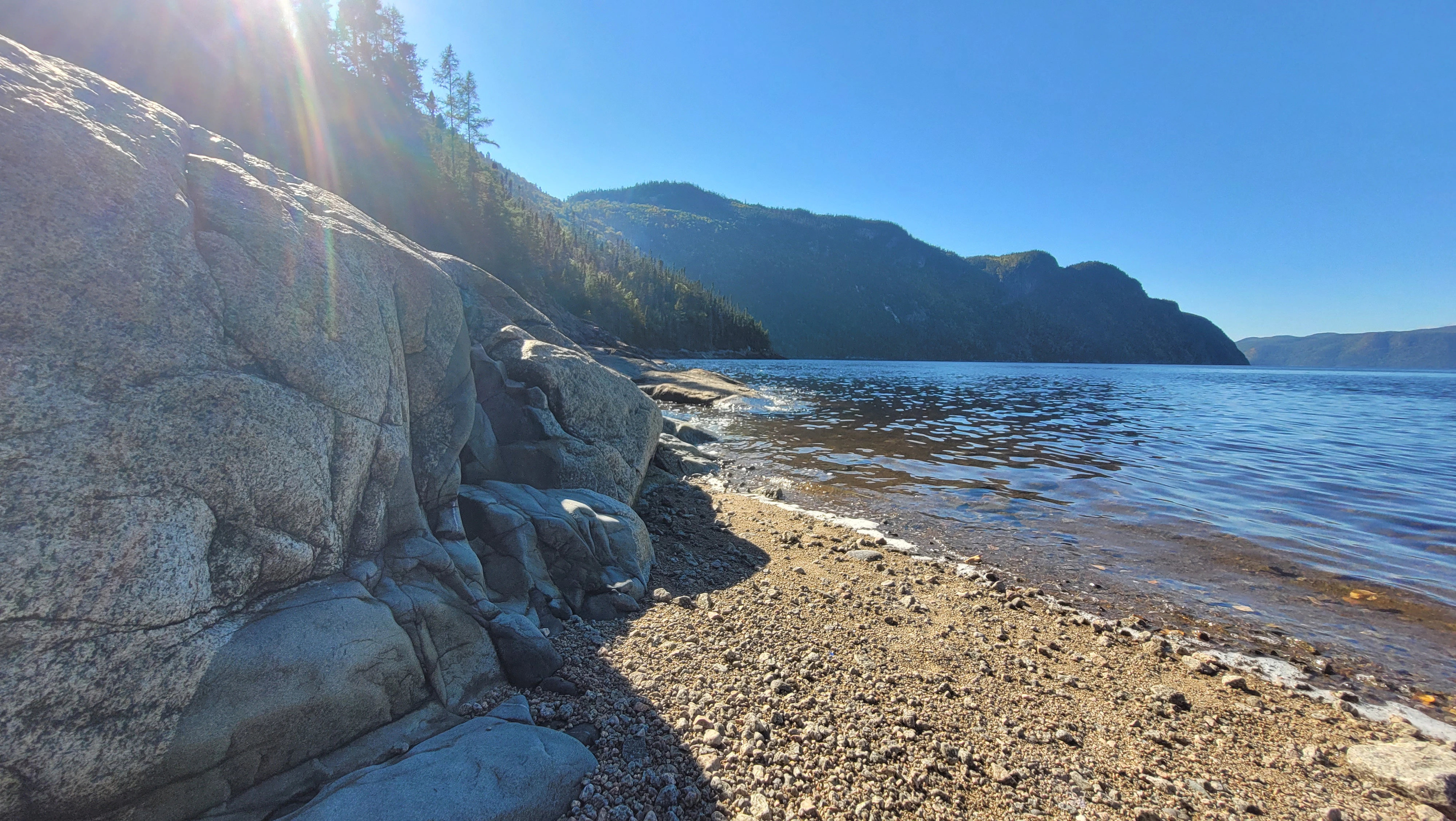 Rocky beach on the shoreline of the Saguenay Fjord