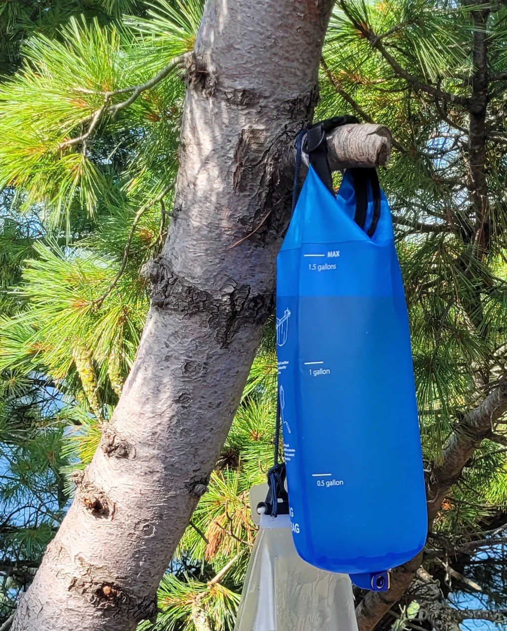Waterdrop gravity water filter hanging from a tree