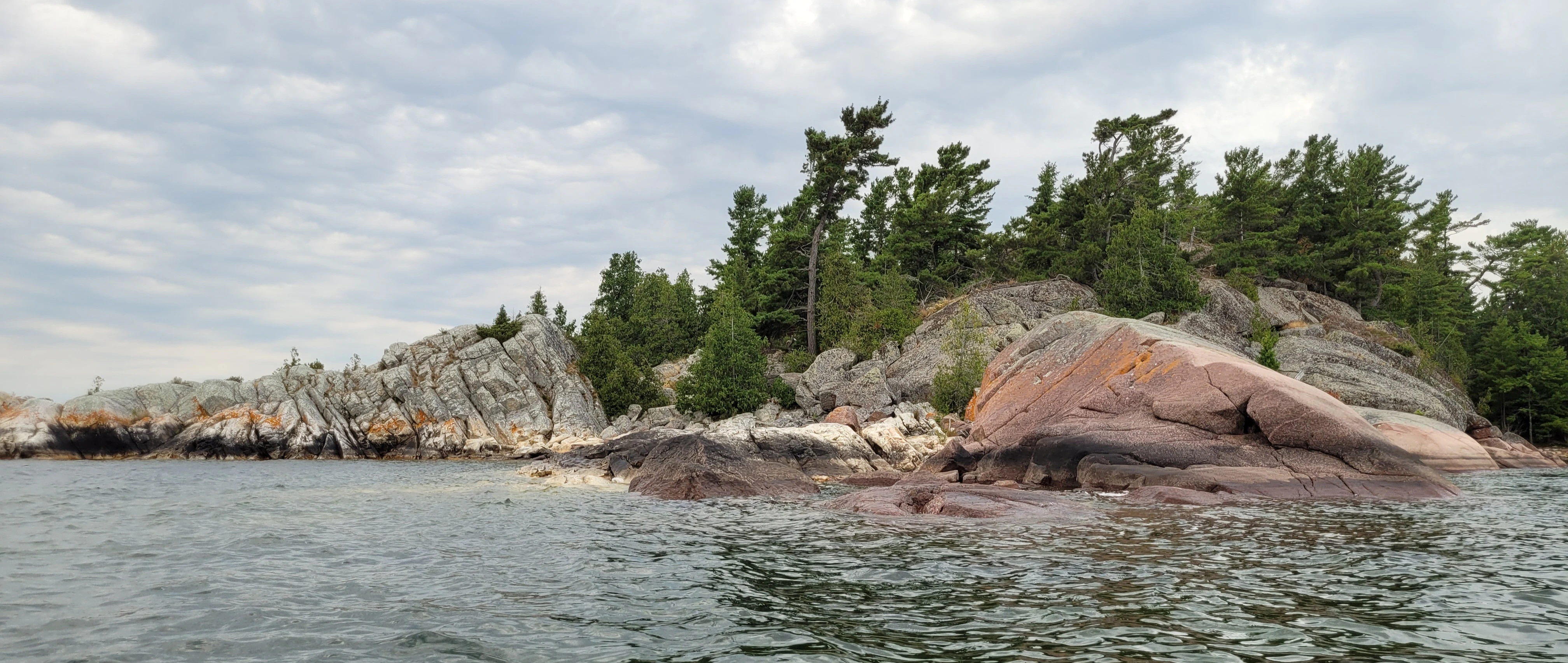 White Quartzite and granite cliffs on South Benjamin Island in Lake Huron's North Channel in Ontario, Canada